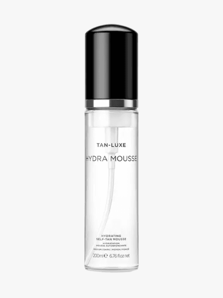 Tan Luxe Hydra Mousse in branded component on a light gray background